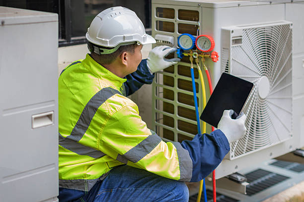 Professional Heat Pump Repair technician working in Maitland, MO